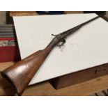 A 19th Century single-shot 12-bore shotgun (deactivated),