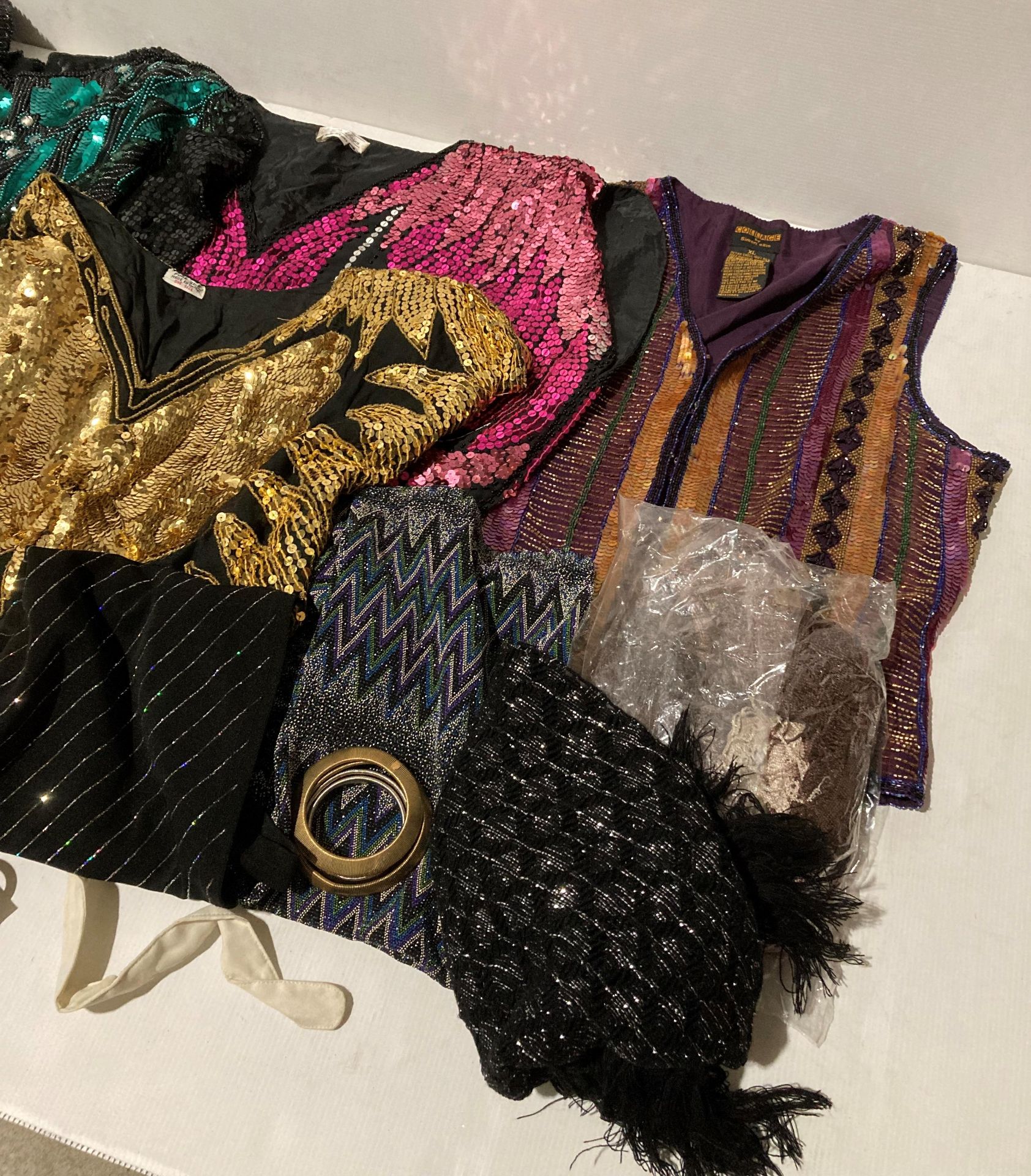 An assortment of vintage clothing - sequin waistcoat and tops in a variety of colours, - Image 3 of 3