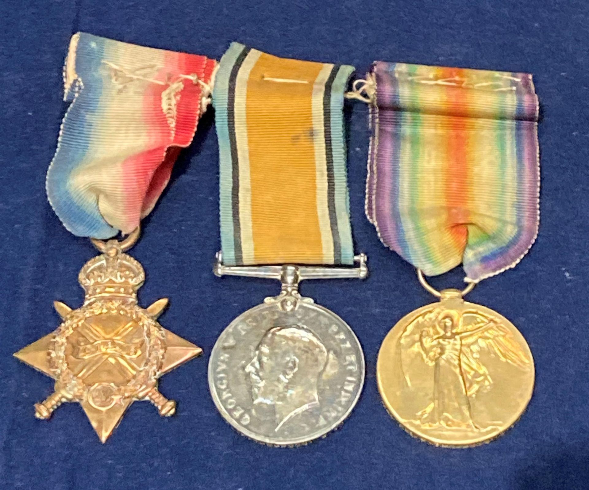 A First World War trio group to include 1914-15 Star,
