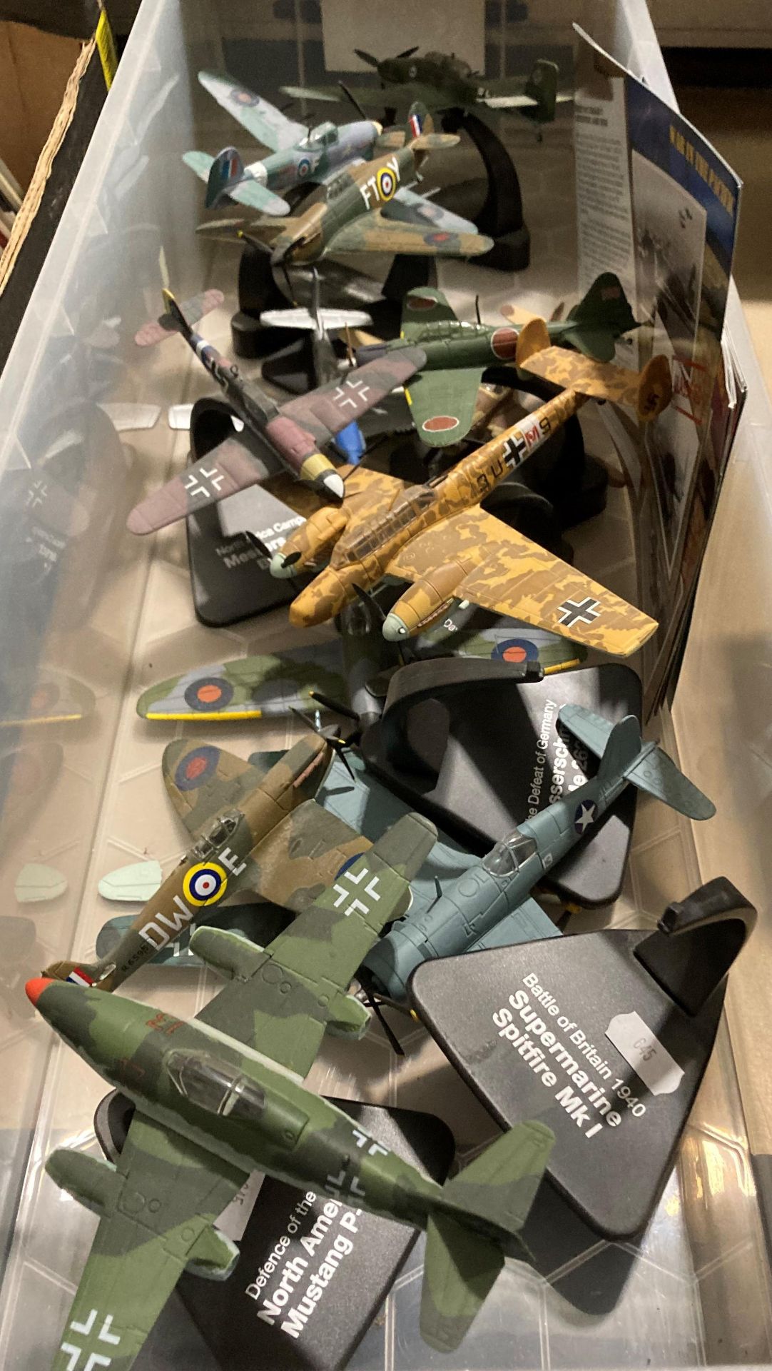 Contents to plastic box - thirteen Atlas Editions scale model Second World War fighter planes and