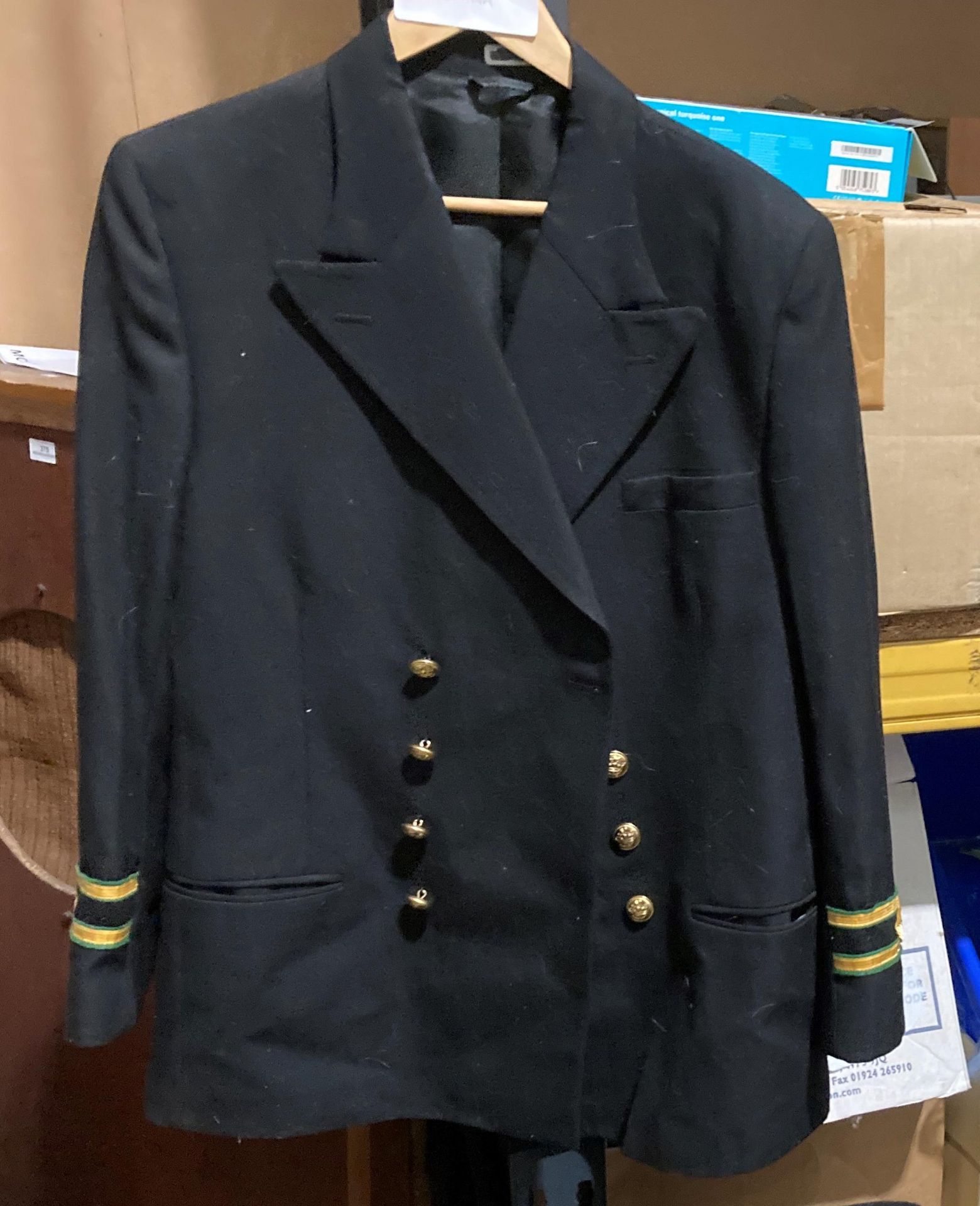 A blue double-breasted seaman's jacket by SM Bass Hull (no size shown),