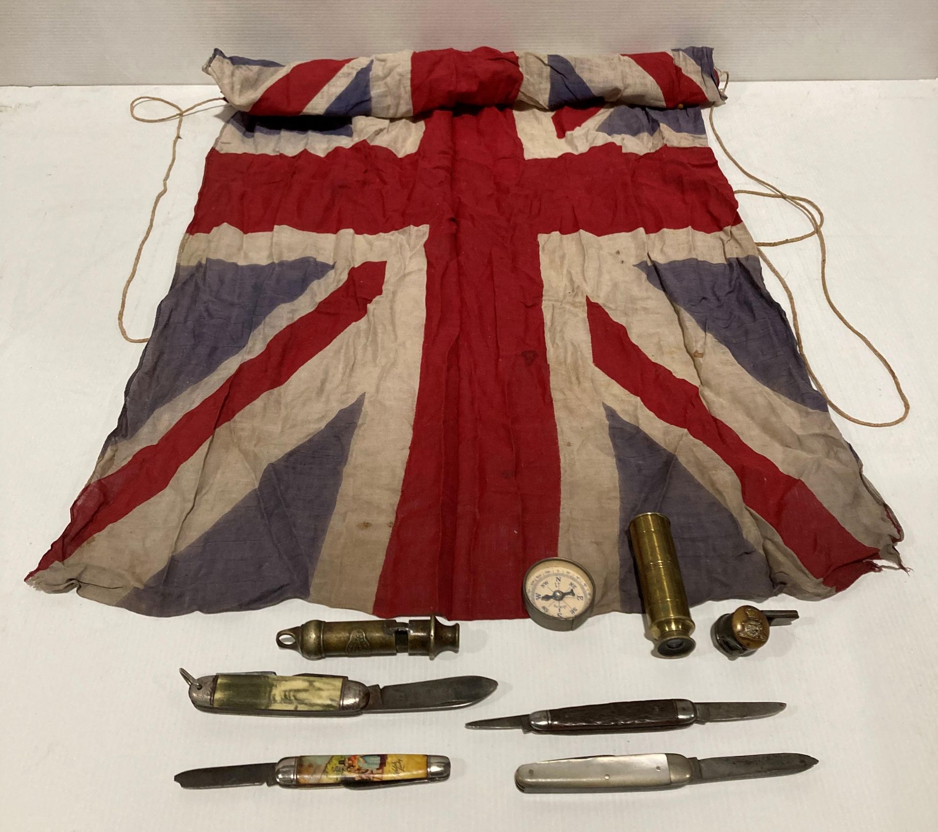 Nine assorted items including vintage Union Jack flag (50 x 80cm), four assorted pen/pocket knives,
