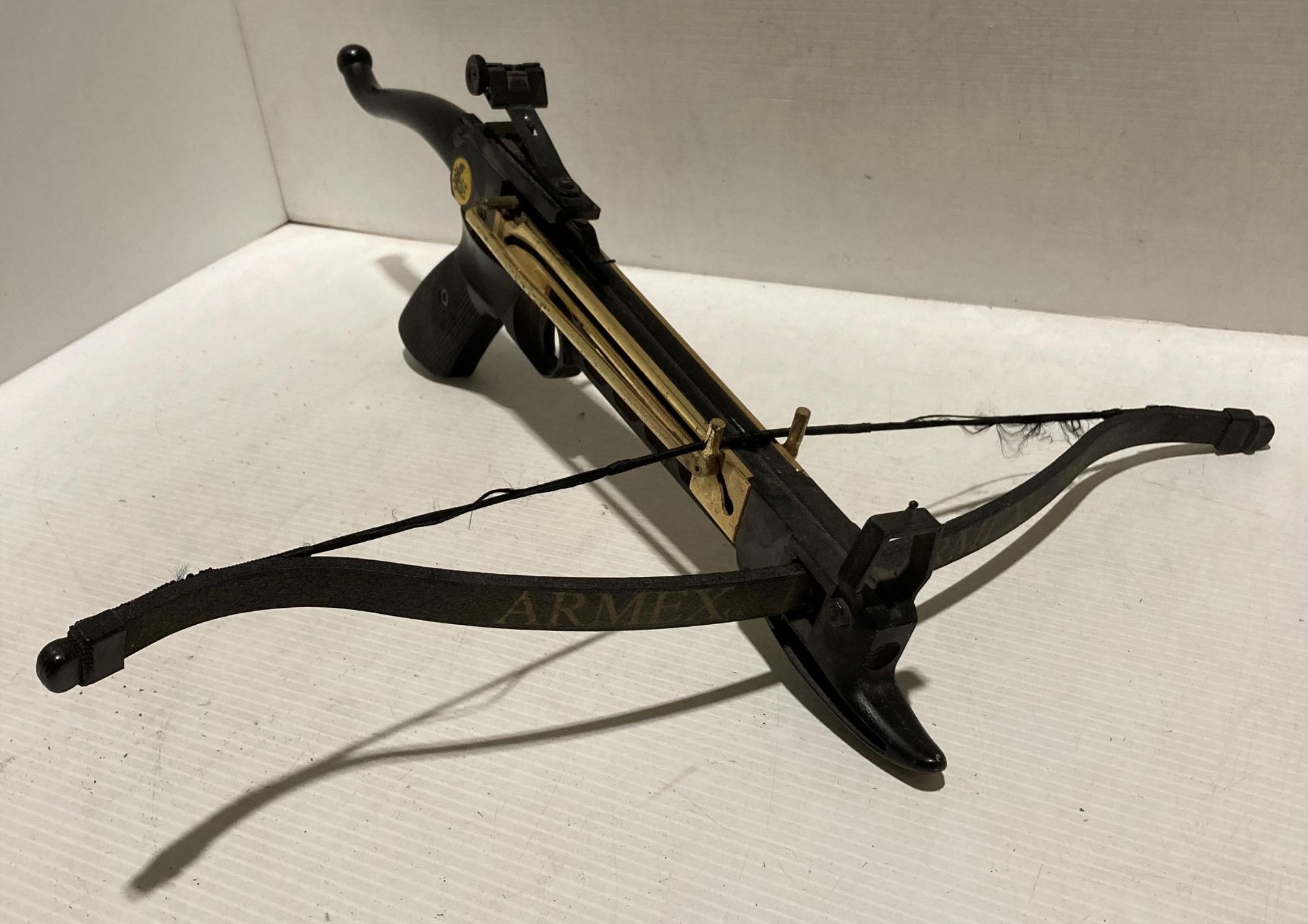 Black and gold coloured self-cocking hand pistol crossbow, - Image 2 of 3
