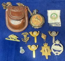 A Franklin Mint Colt pocket watch in case and a quantity of Military cap and other badges (Saleroom