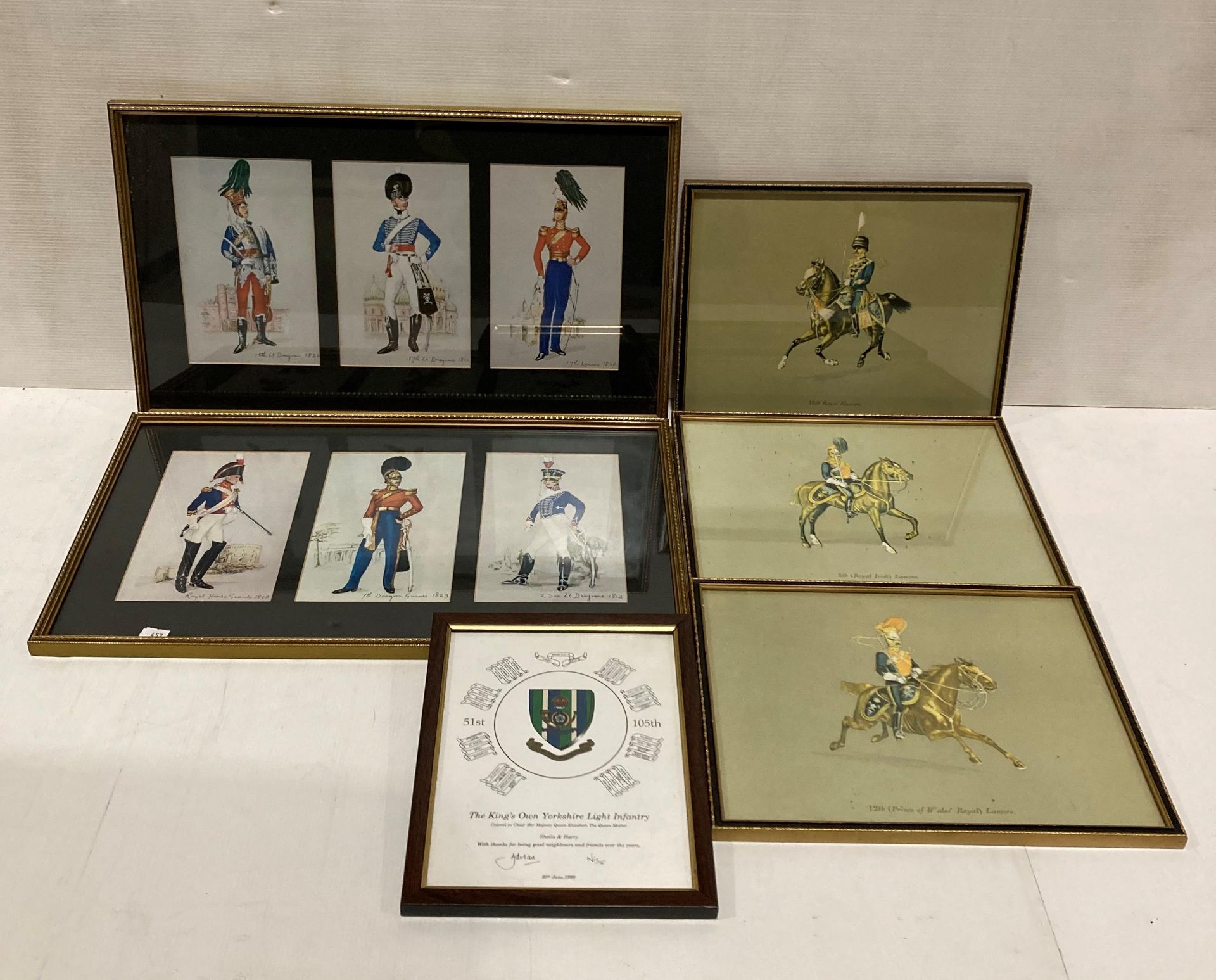 Two framed prints displaying British soldiers of early 19th Century (three per frame - 30 x 50cm)