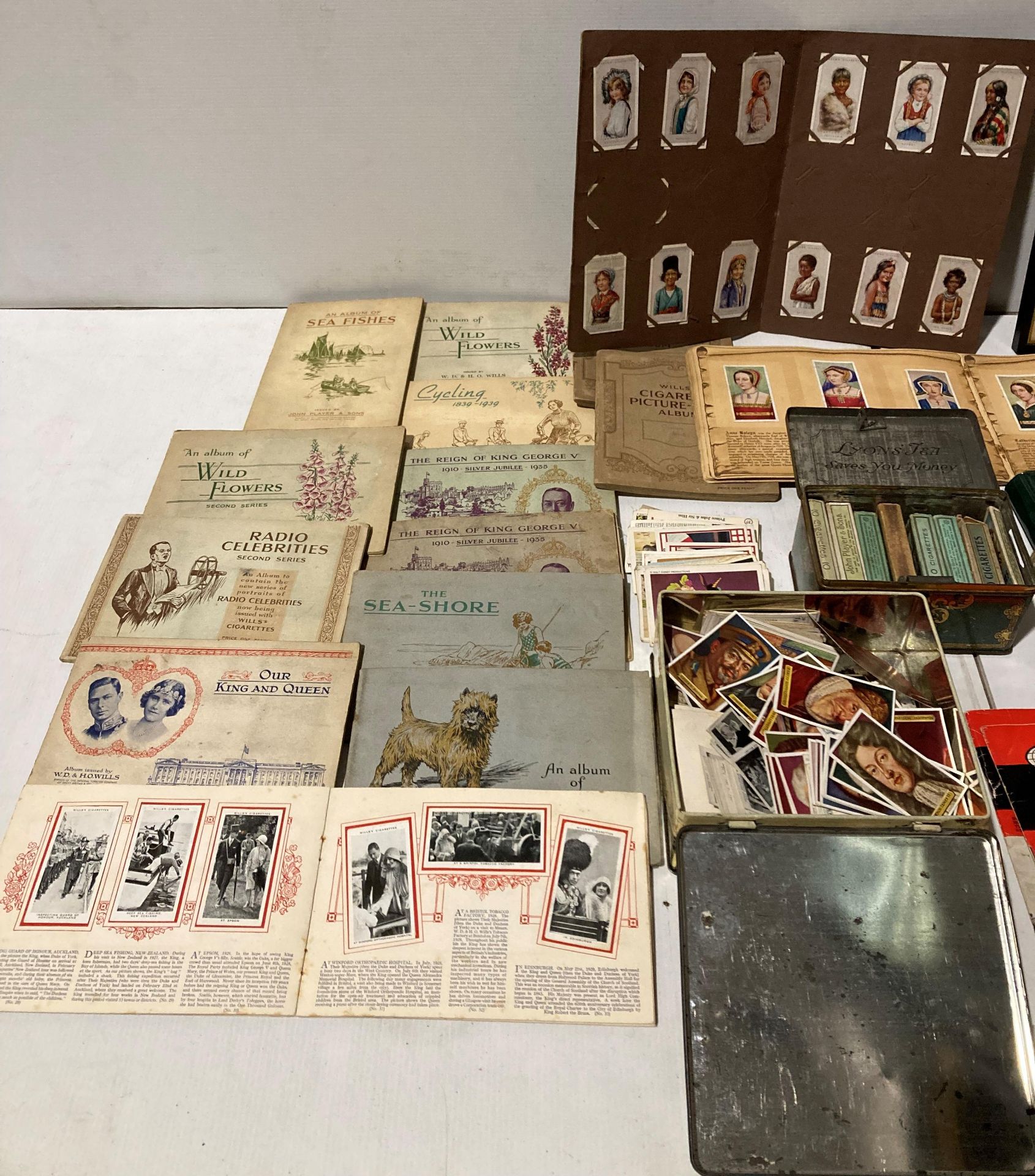 Contents to two boxes - 15 cigarette card booklets and two tins of assorted cigarette cards, - Image 2 of 5
