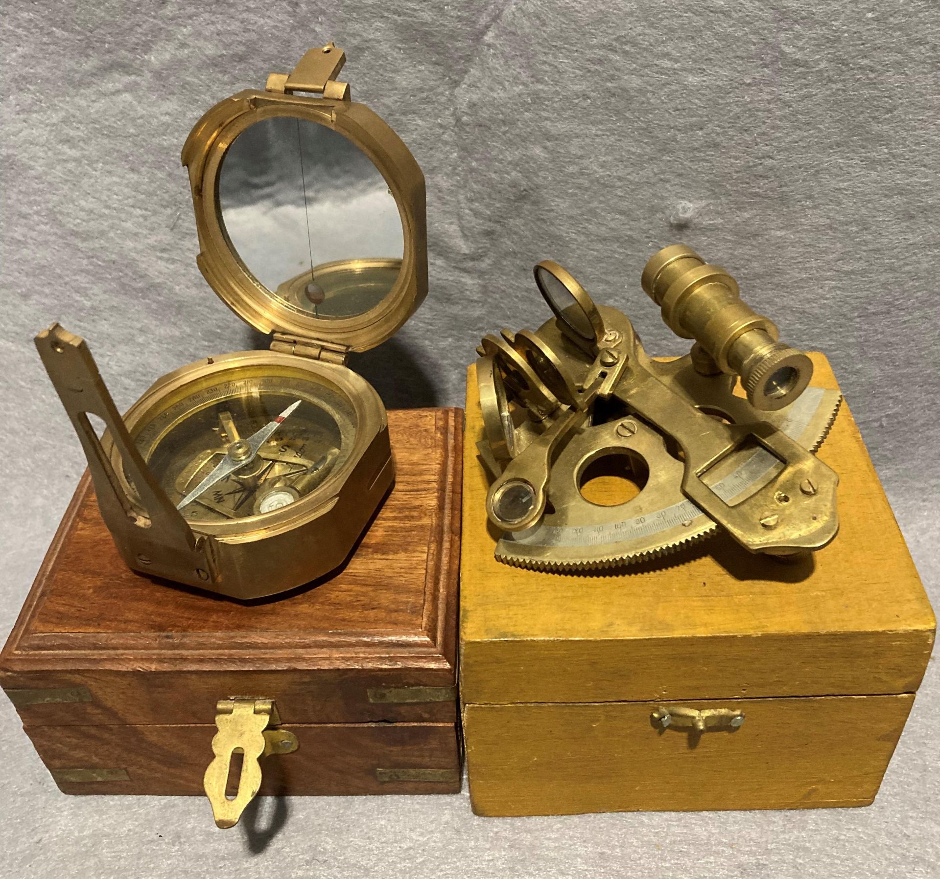 Vintage Stanley London brass natural sine nautical compass and a brass nautical hand-held sextant