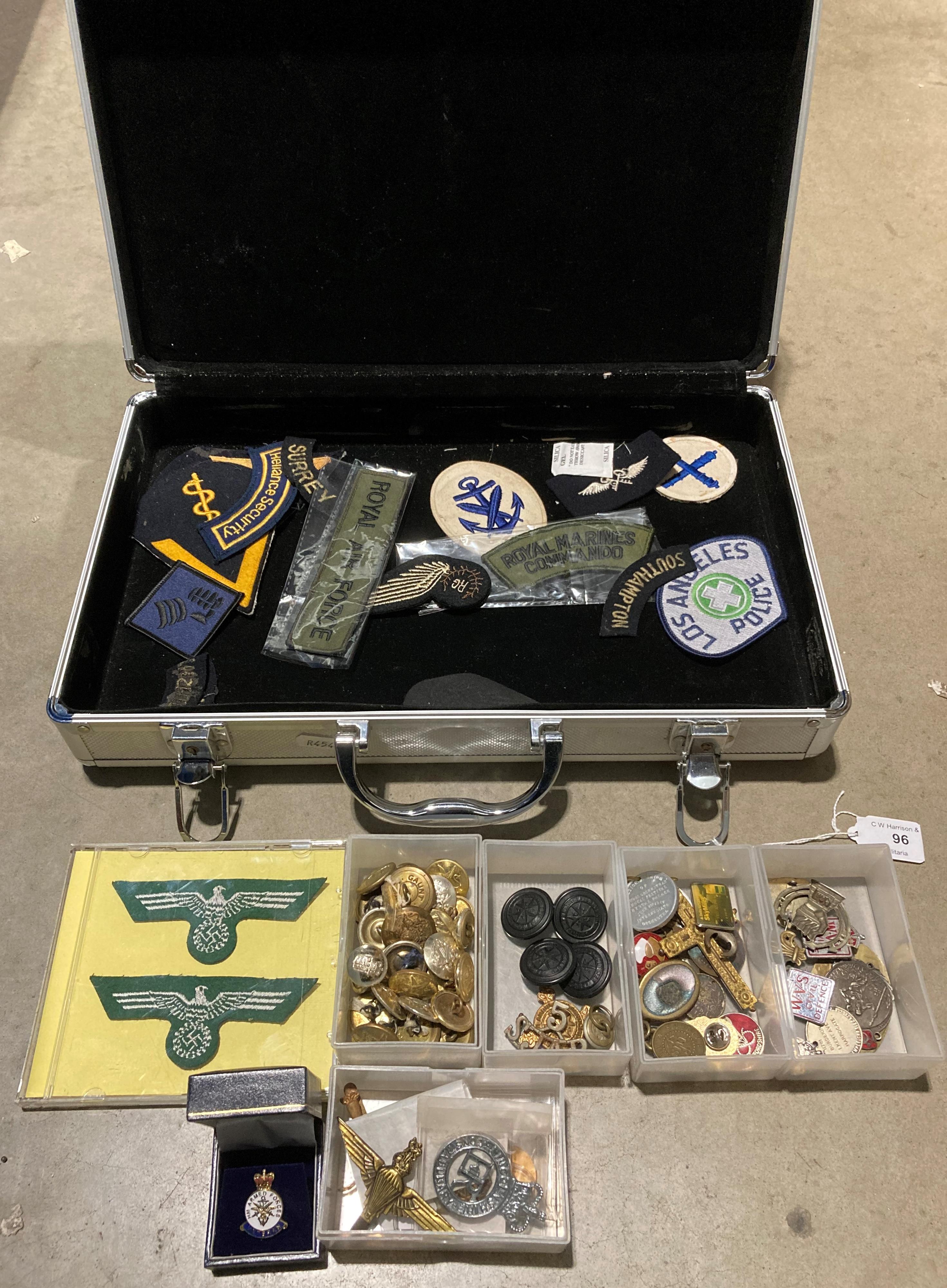 Aluminium case and contents - military and civil defence related badges, cap badges, buttons,