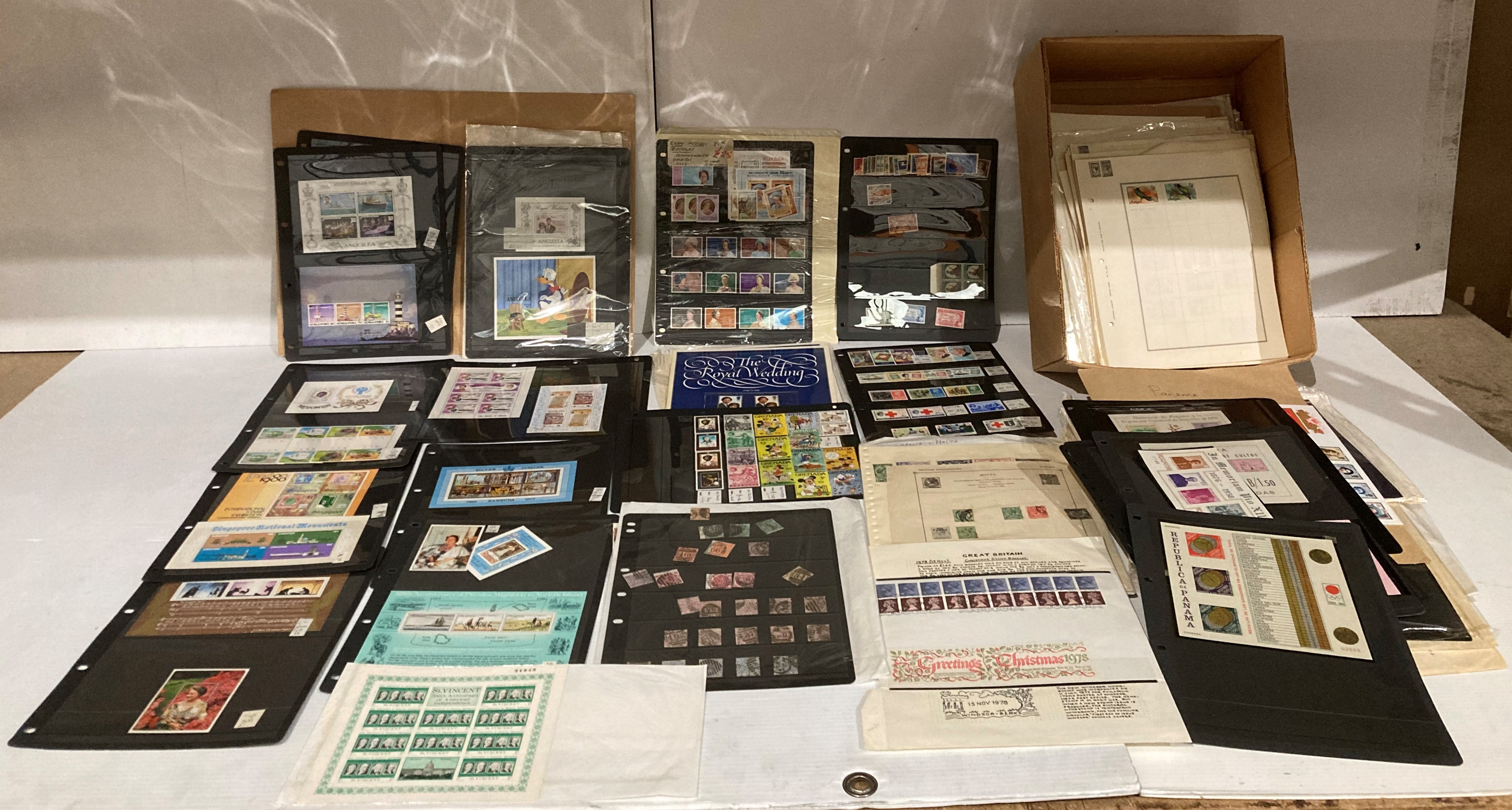 Contents to box - large quantity of mounted stamp sheets and commemorative stamps (Saleroom