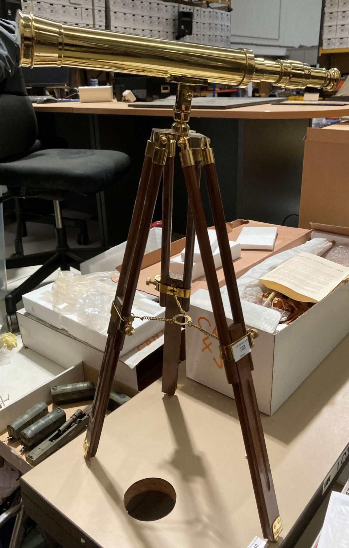 A modern brass telescope by Nauticalia on wooden and brass stand (saleroom location: S2 table