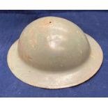 World War I/II Doughboy combat helmet and chin strap (Saleroom location: S3 QC06)