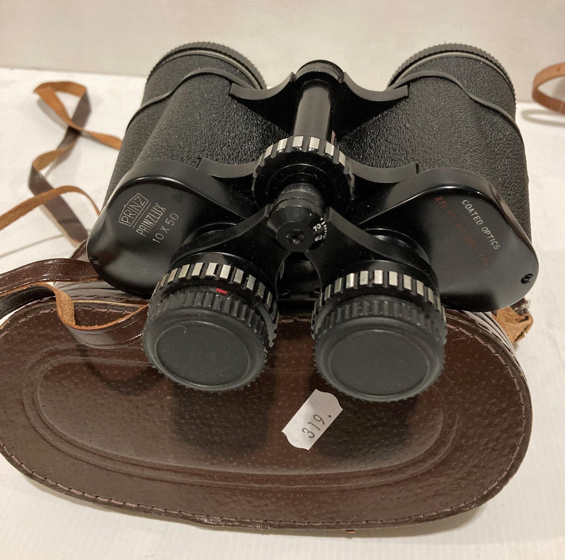 A pair of Prinz Prinzlux 10x50 and a pair of Stratus 8x30 binoculars (Saleroom location: S2 Counter - Bild 2 aus 3