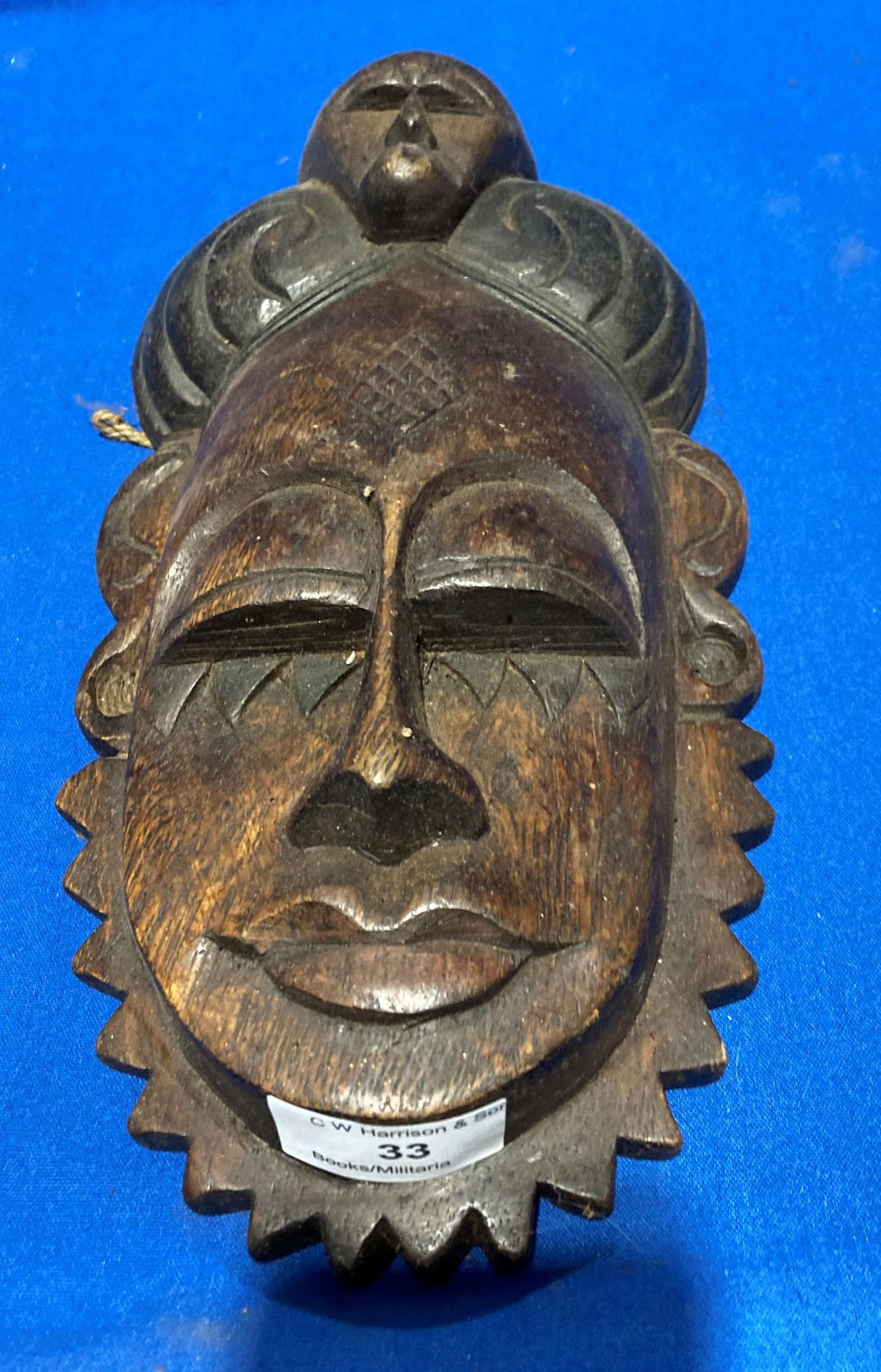 A tribal wood wall mask,