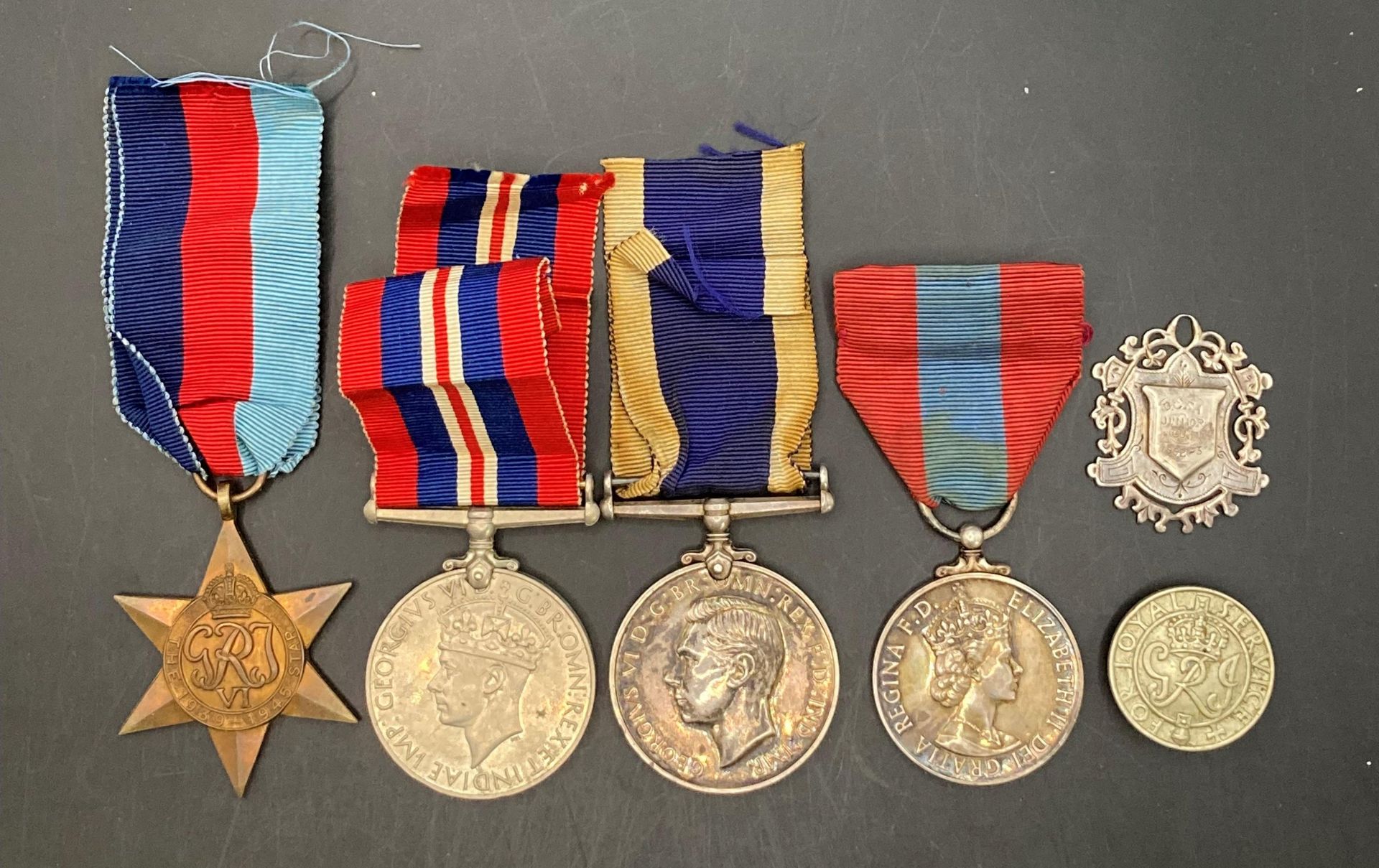 A 1939-1945 Star, War Medal, Royal Navy Long Service Medal GVi to Ply.
