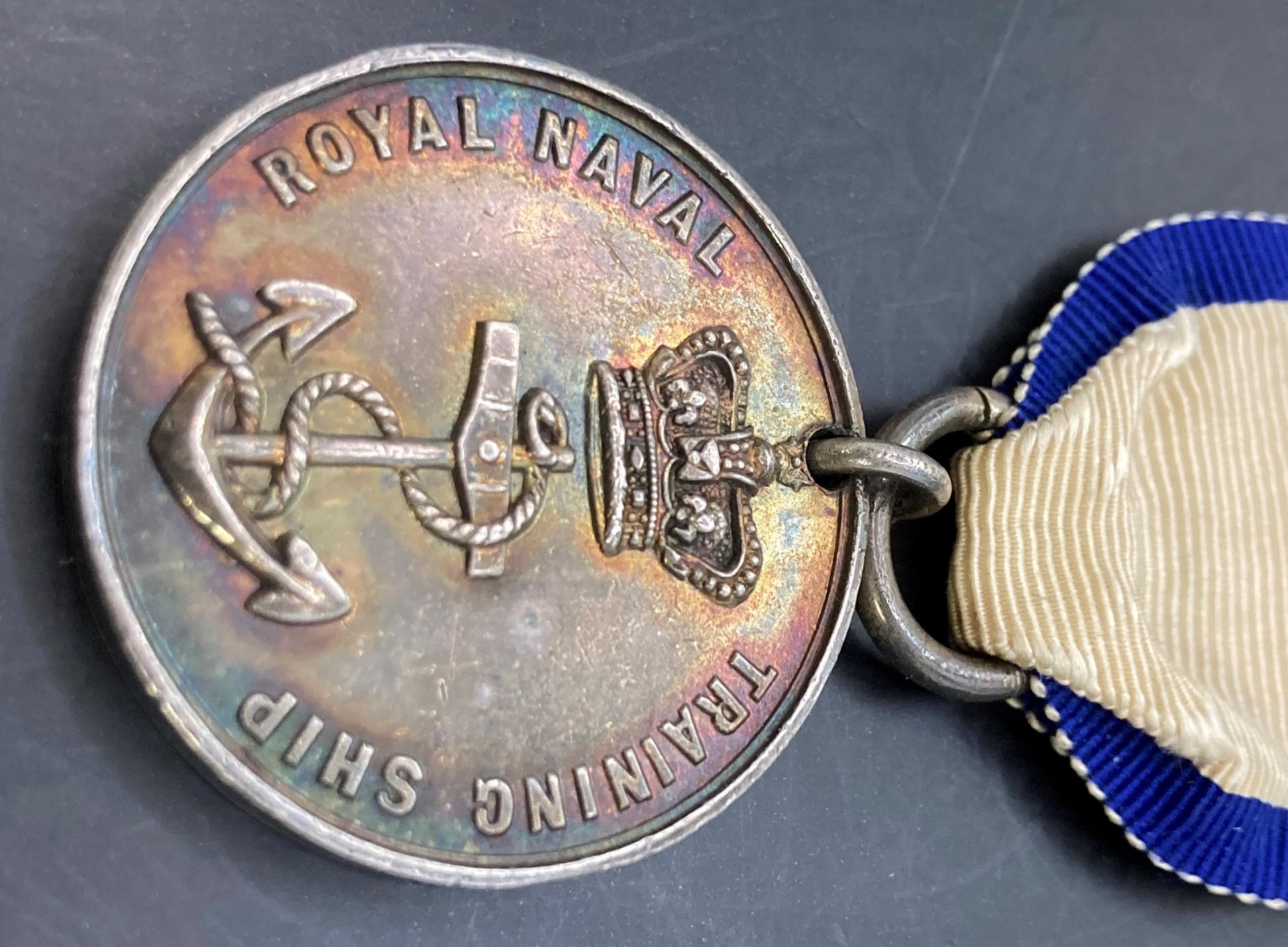 HMS Warspite Royal Naval Training Ship Medal as a Reward of Merit in silver.