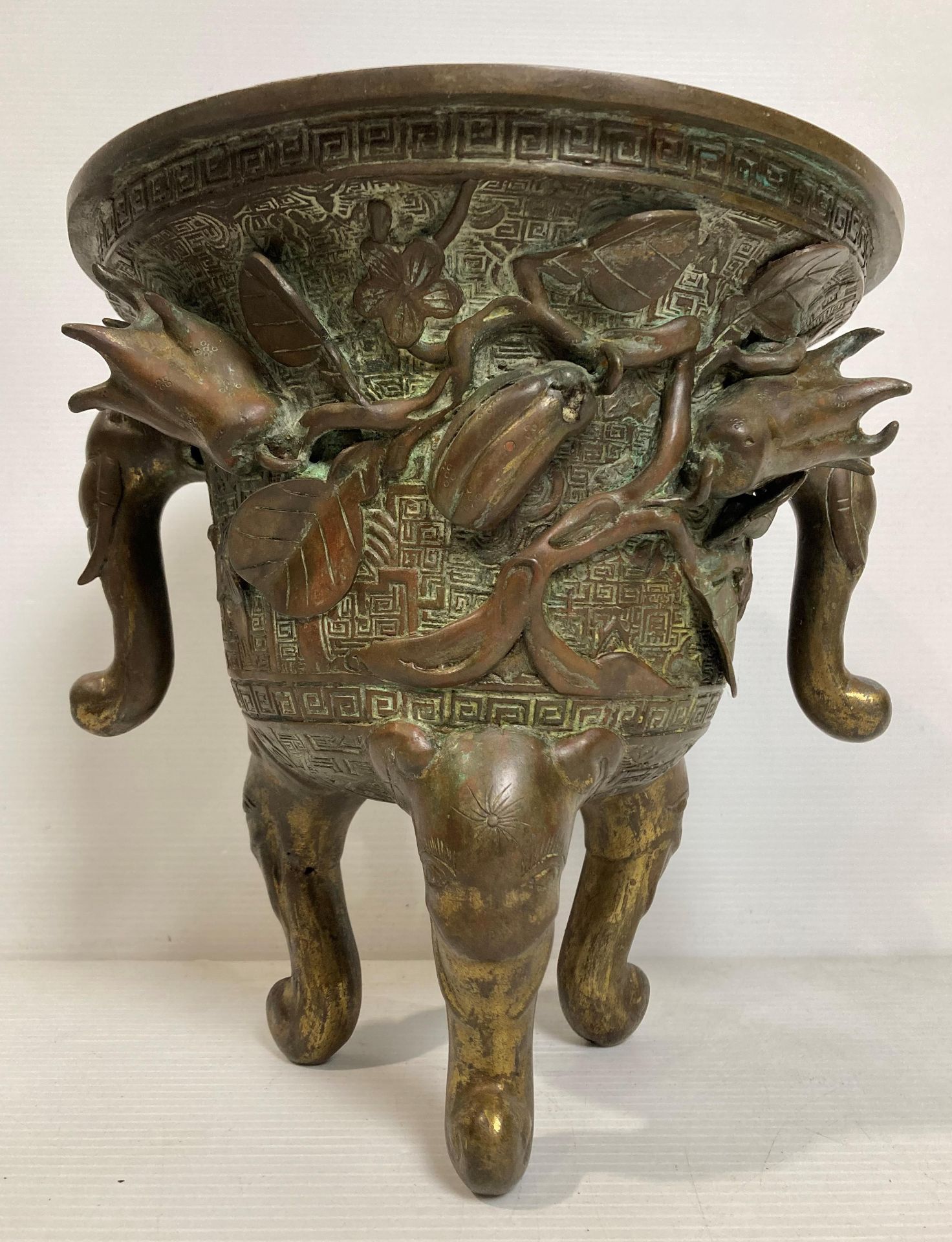 An Oriental bronze incense burner with elephant head legs and two elephant head handles with - Image 4 of 21