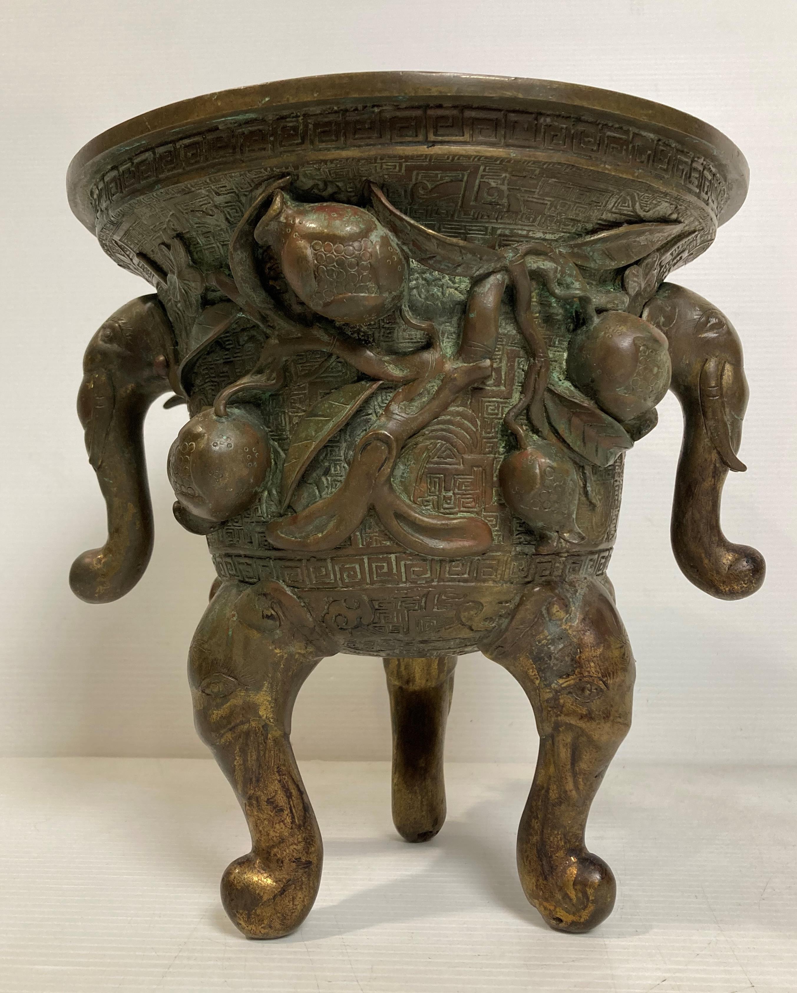 An Oriental bronze incense burner with elephant head legs and two elephant head handles with - Image 6 of 21