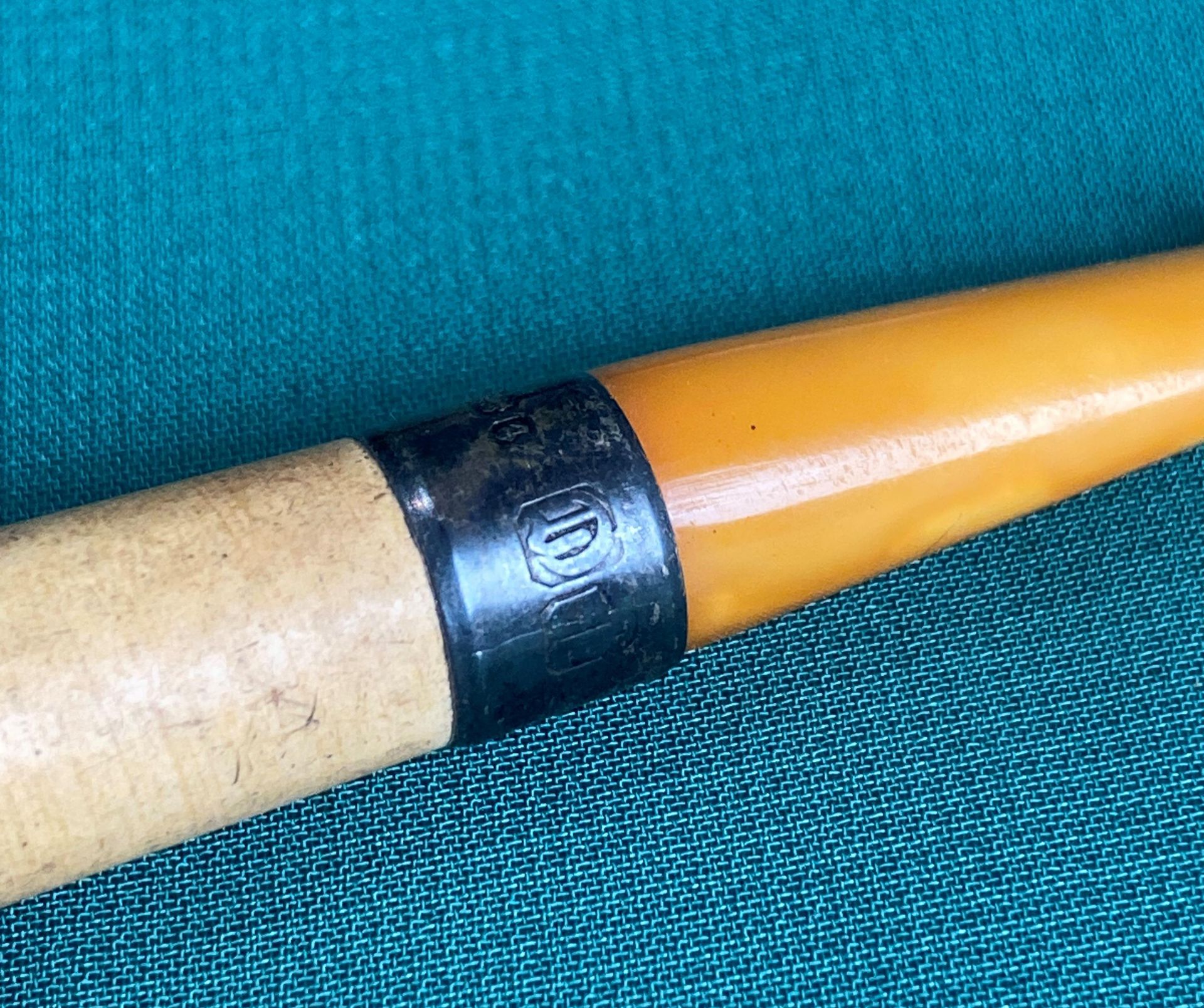 A cigarette holder with possibly amber end and silver collar in original leather case (saleroom - Image 3 of 4