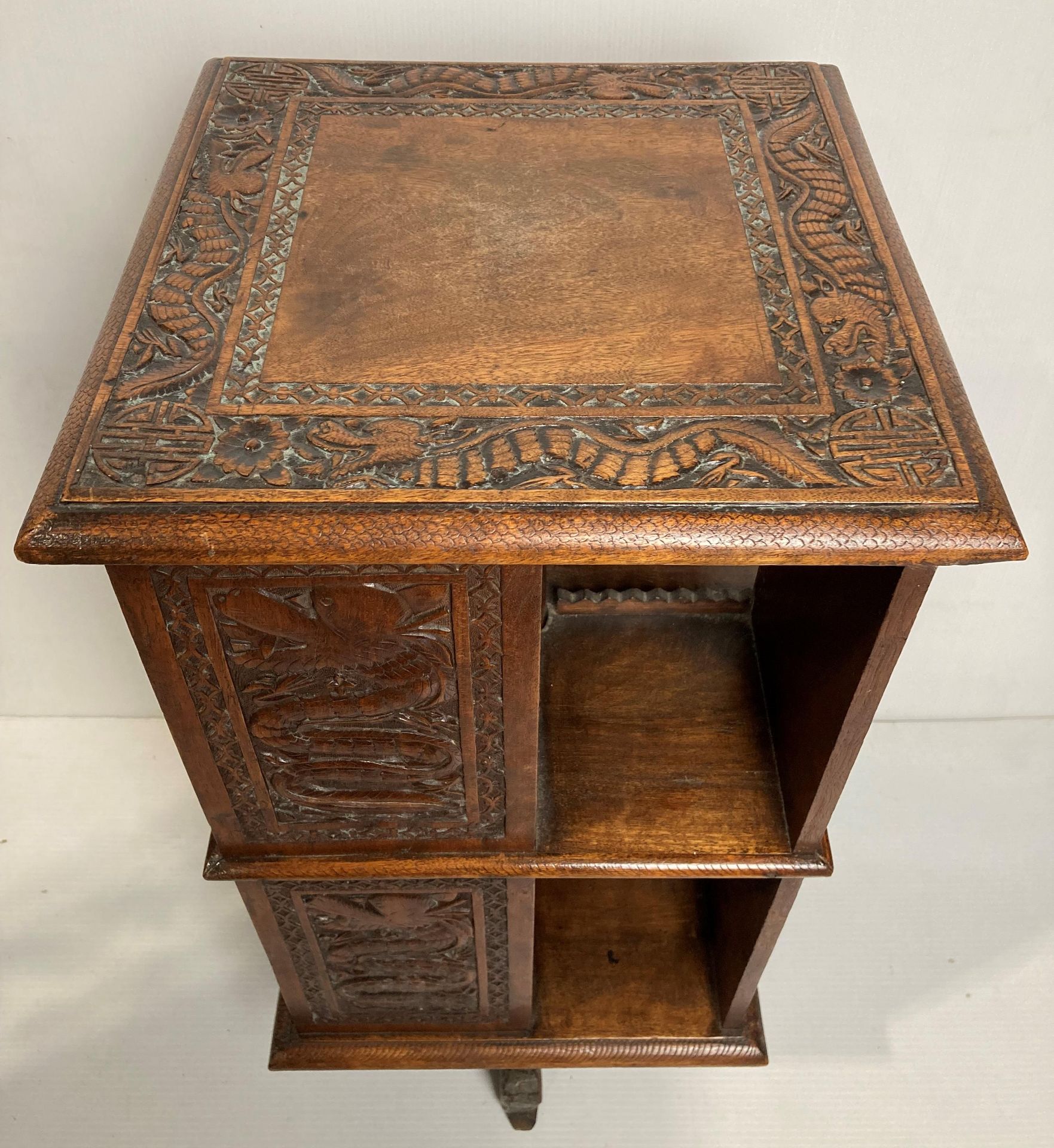 A Oriental wooden hand-carved revolving bookcase with dragons to panels and four dragon feet, - Image 5 of 10