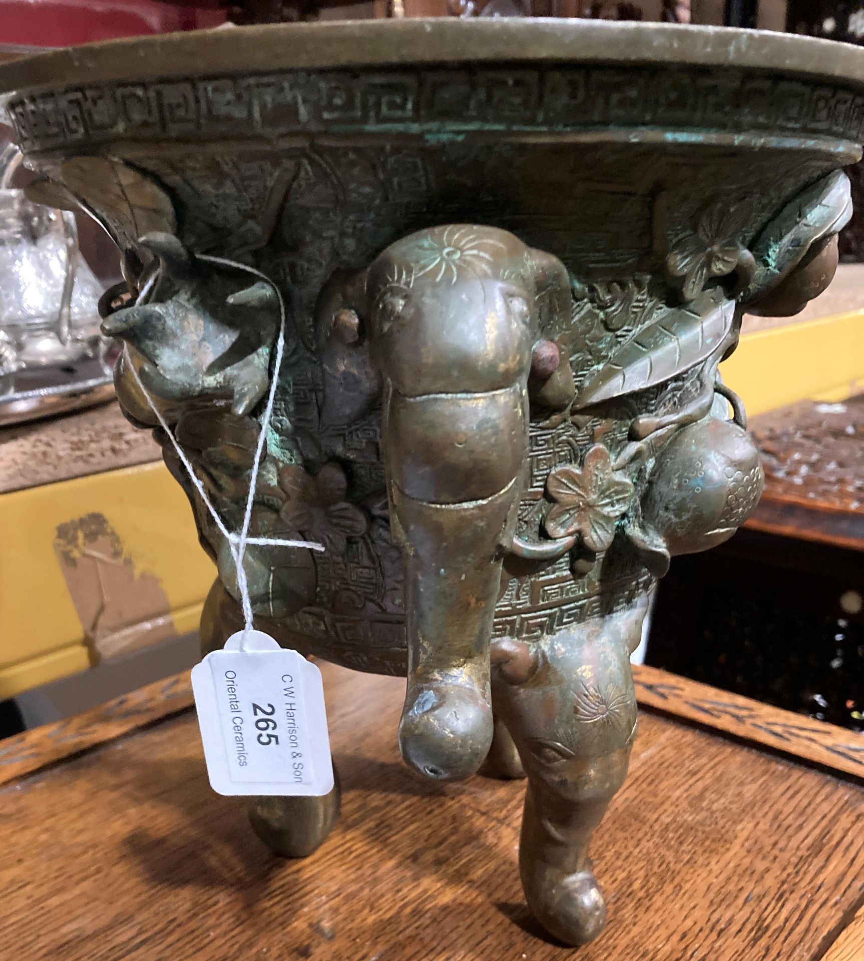 An Oriental bronze incense burner with elephant head legs and two elephant head handles with - Image 10 of 21