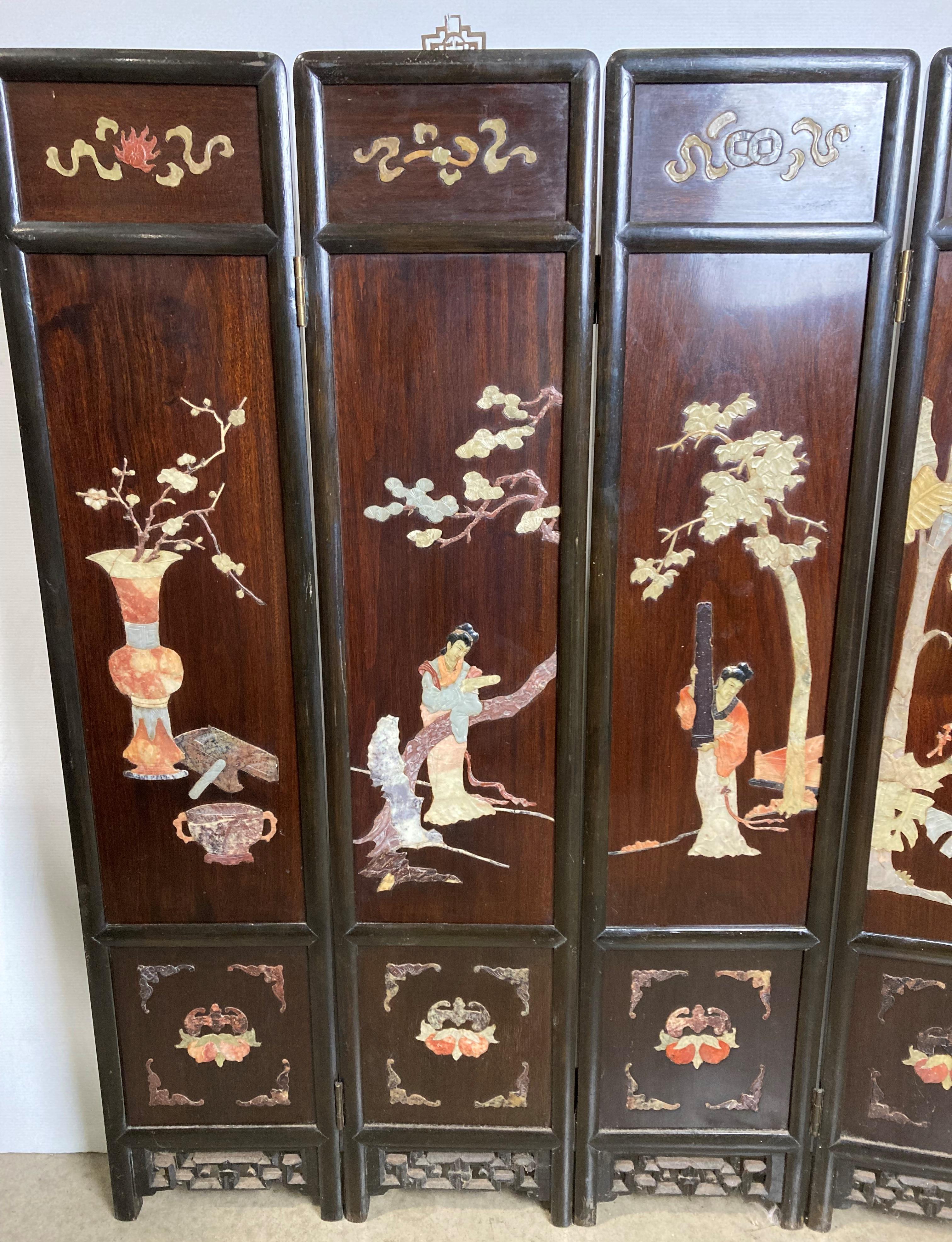 A Mid-Century Oriental six-panel folding screen with soap stone display to each panel and etching - Image 4 of 13