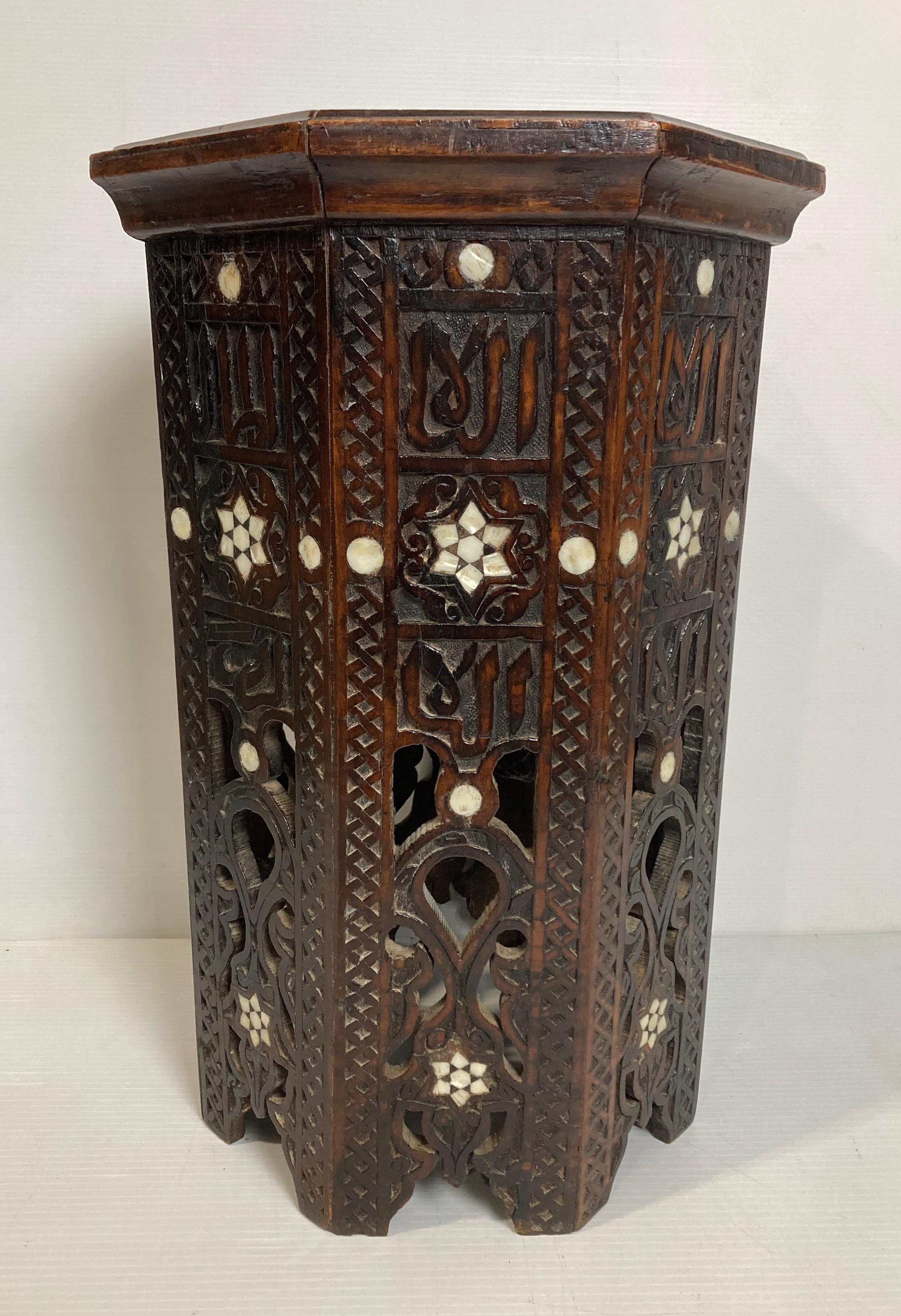 A hand-carved wooden Moorish eastern octagonal side table with mother of pearl inlay, - Image 2 of 6