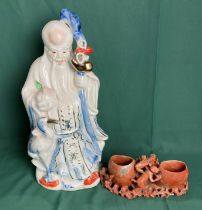 Porcelain Oriental figurine of Shou Xing and a carved agate double brush pot (saleroom location: S1