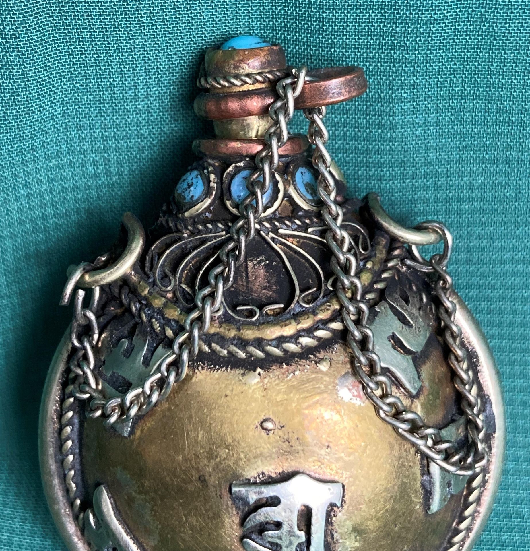 An antique Chinese/Tibetan hand-made metal snuff/opium bottle with light blue stones, - Image 4 of 4