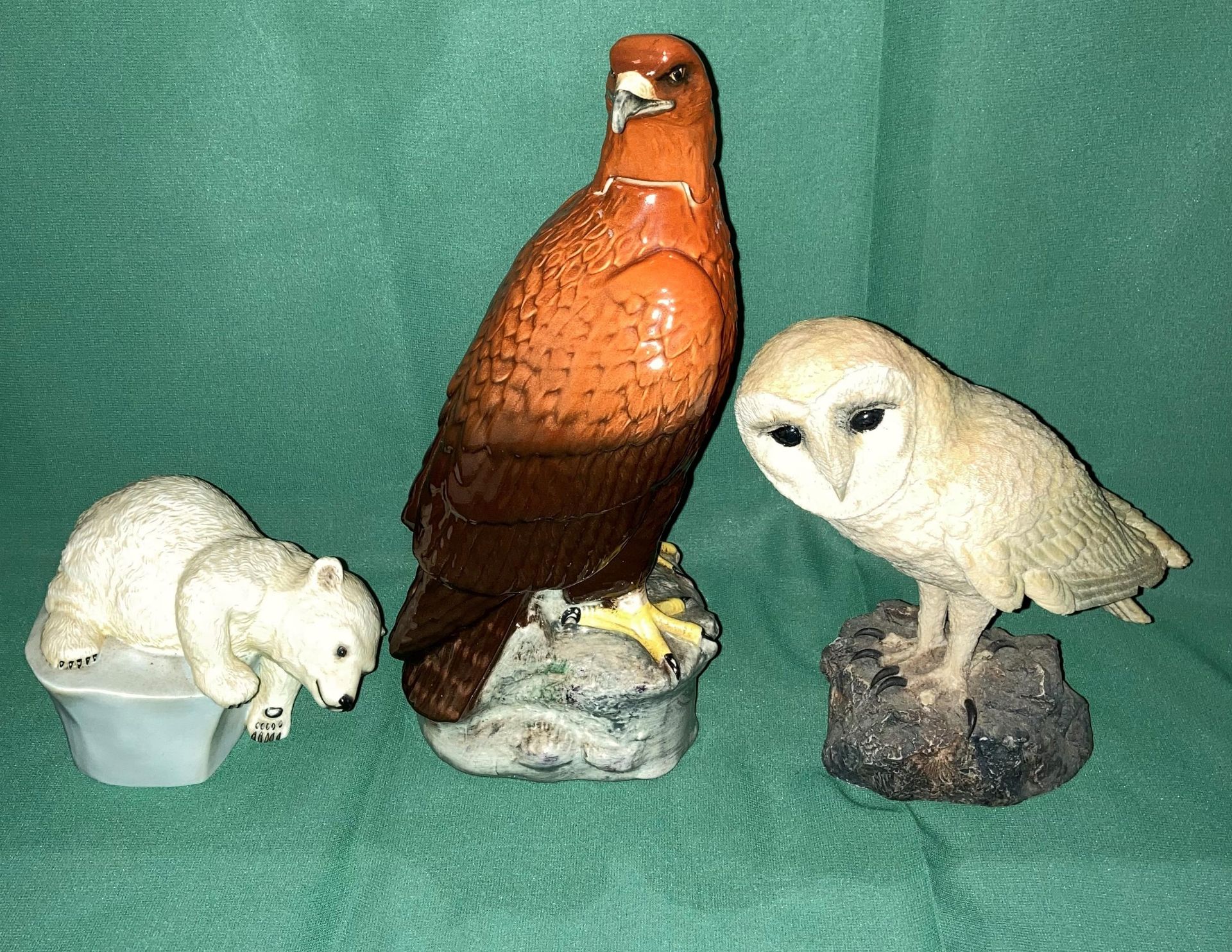 Three items including a Beswick 1969 golden eagle decanter with stopper and lid (26cm high - no