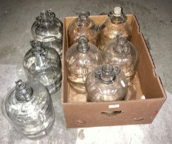 Eight glass Demijohns (saleroom location: S1 QA06)