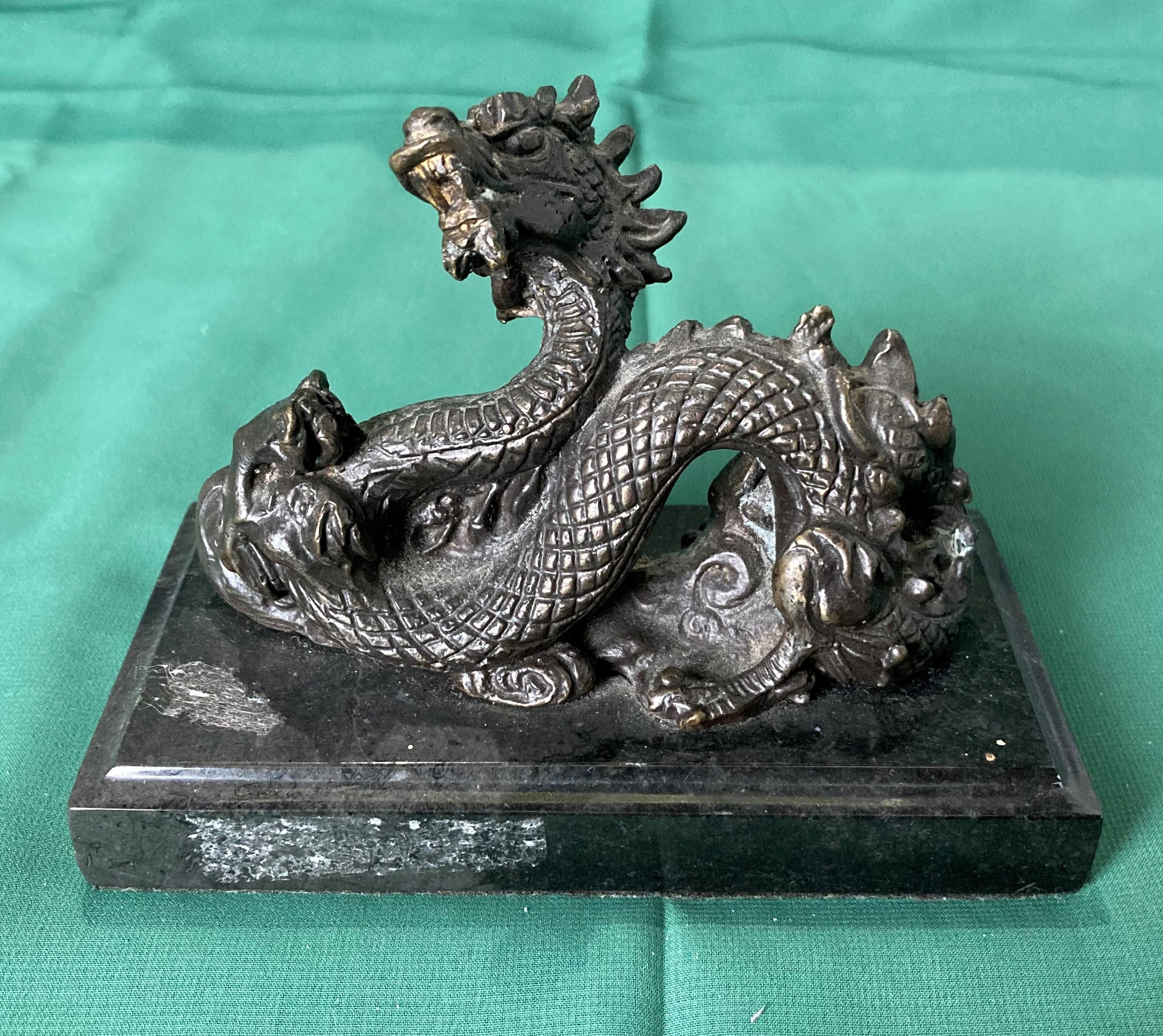 Bronze dragon sculpture on black marble base, 10cm high x 13.