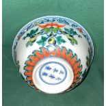 An antique Chinese Doucai hand-painted bowl with foliage design and markers mark to base - Qing
