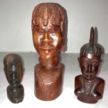 Three wooden hand-carved African figurines and bust including one lady and two men (saleroom