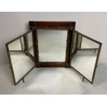 An Oriental bi-folding vanity/shaving mirror with engraved metal work edging and hand-painted