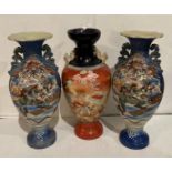 Pair of Oriental hand-painted tall vases (47cm high) and one other vase (47cm high) hand-painted