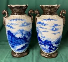 A pair of blue and white vases (33cm high) possibly Dutch,