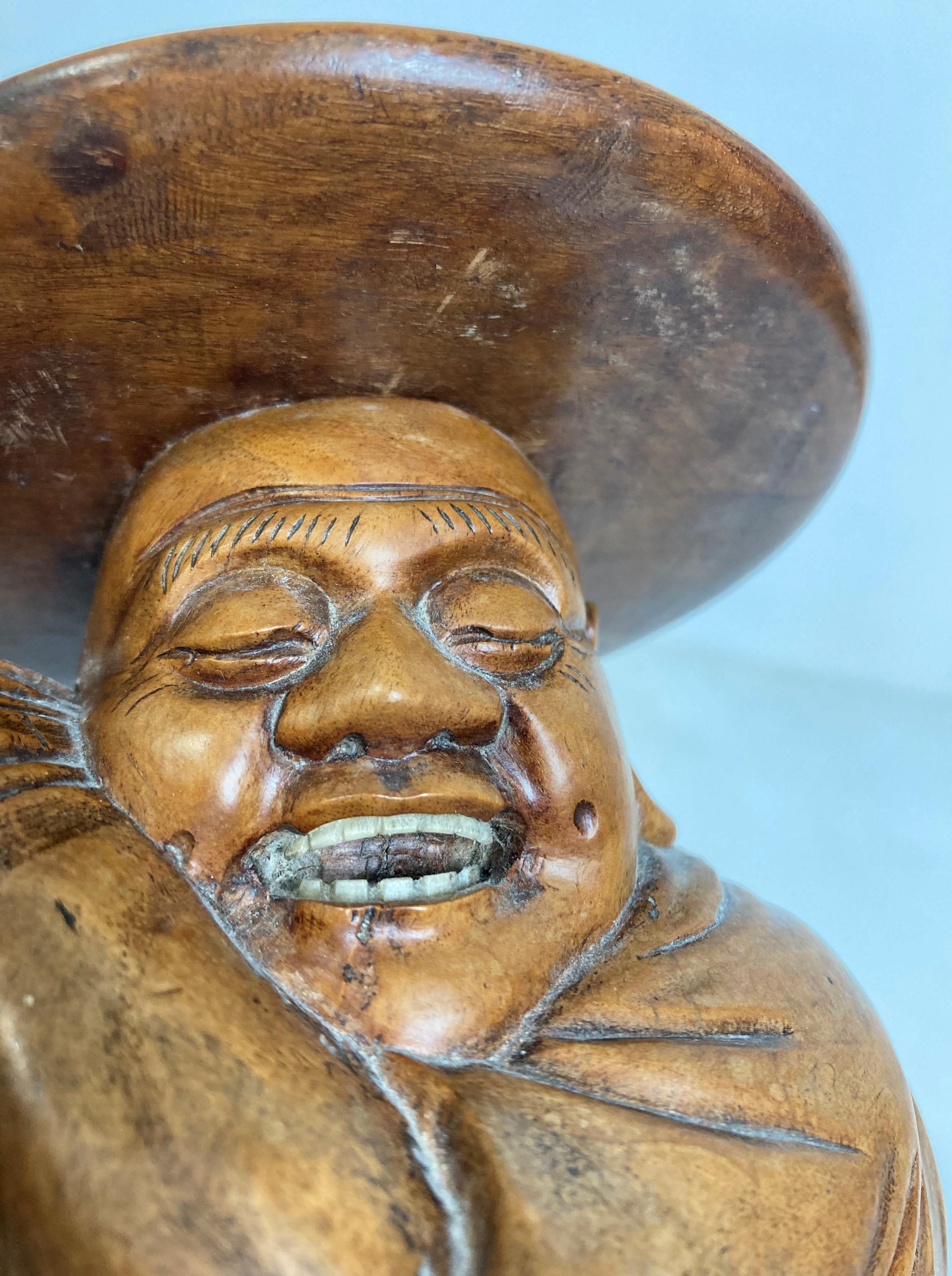 An Oriental wooden hand-carved figurine of sleeping man with engraved hat, - Image 5 of 7