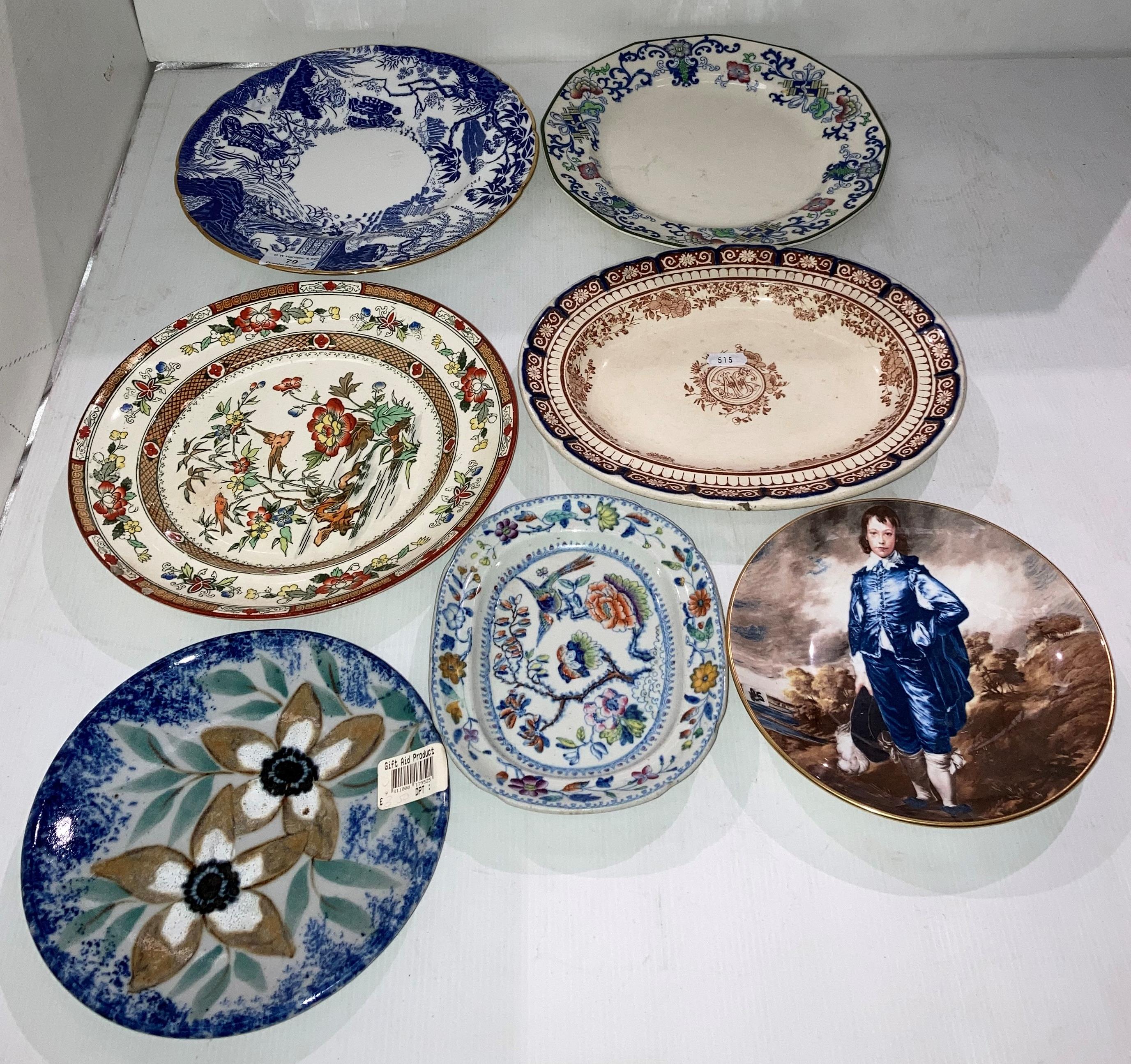 Seven assorted plates including a hand-painted oval plate, Wedgwood oval serving plate,