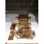 Three wooden hand-made chess sets with cast metal figures,