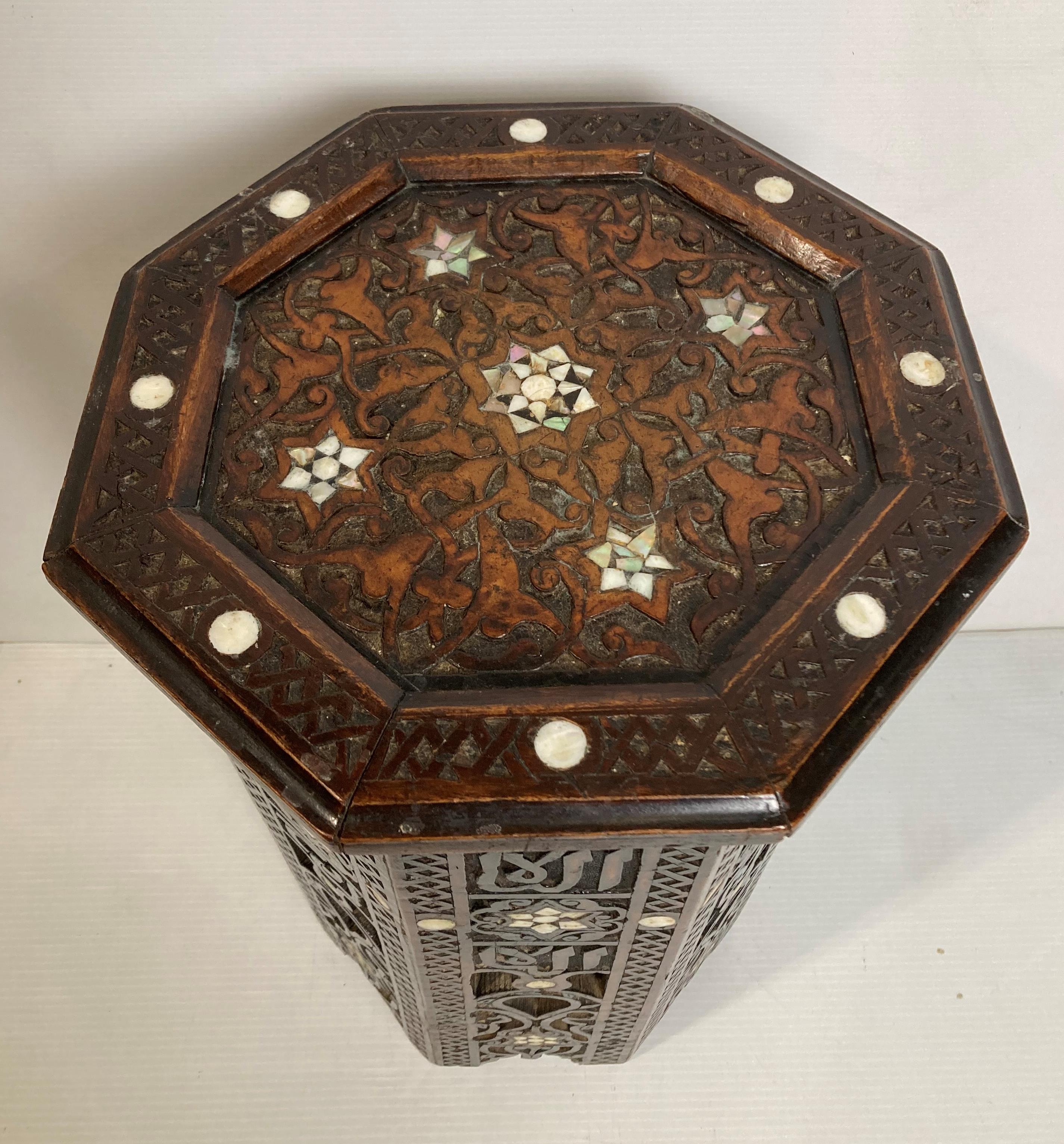 A hand-carved wooden Moorish eastern octagonal side table with mother of pearl inlay, - Image 3 of 6