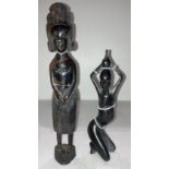 Two wooden hand-carved African figurines of ladies,