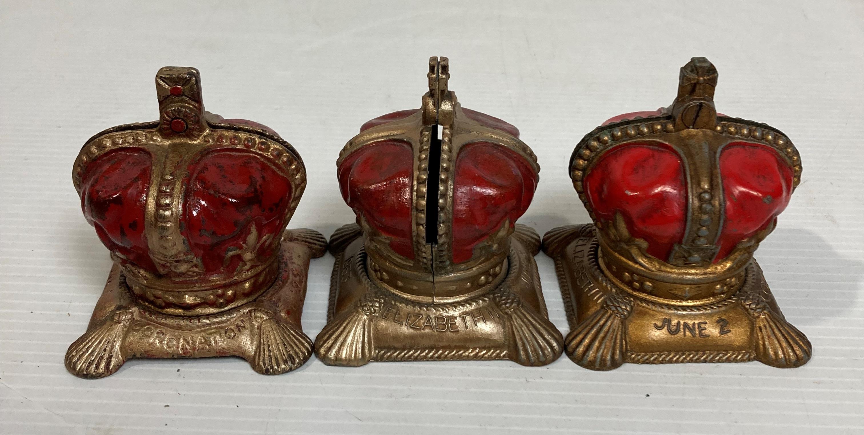 Four items including a vintage brass hand bell and three metal Elizabeth II crown money boxes - Image 3 of 4