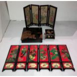 Three wooden assorted black lacquered items including two hand-painted boxes,