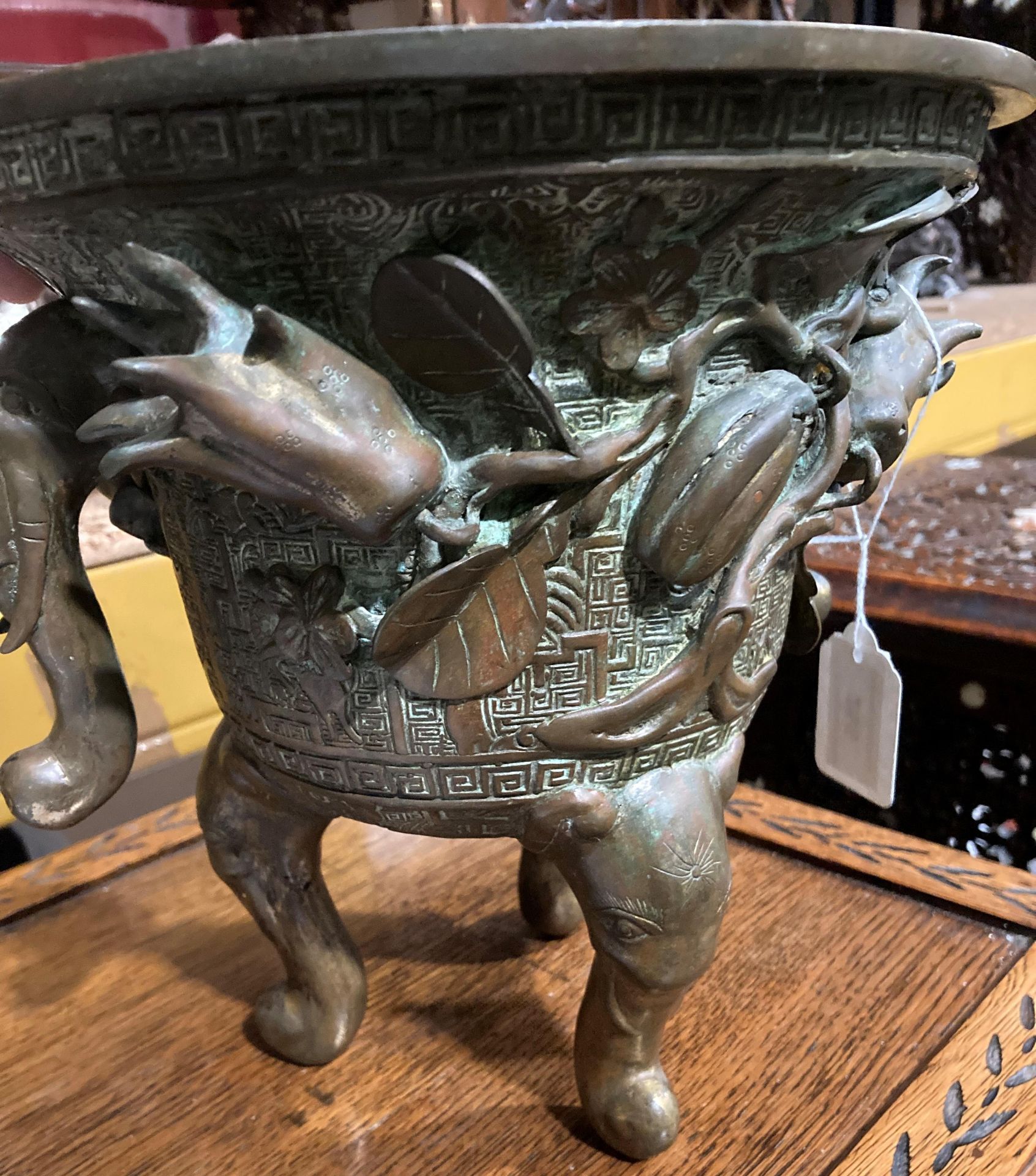 An Oriental bronze incense burner with elephant head legs and two elephant head handles with - Image 14 of 21