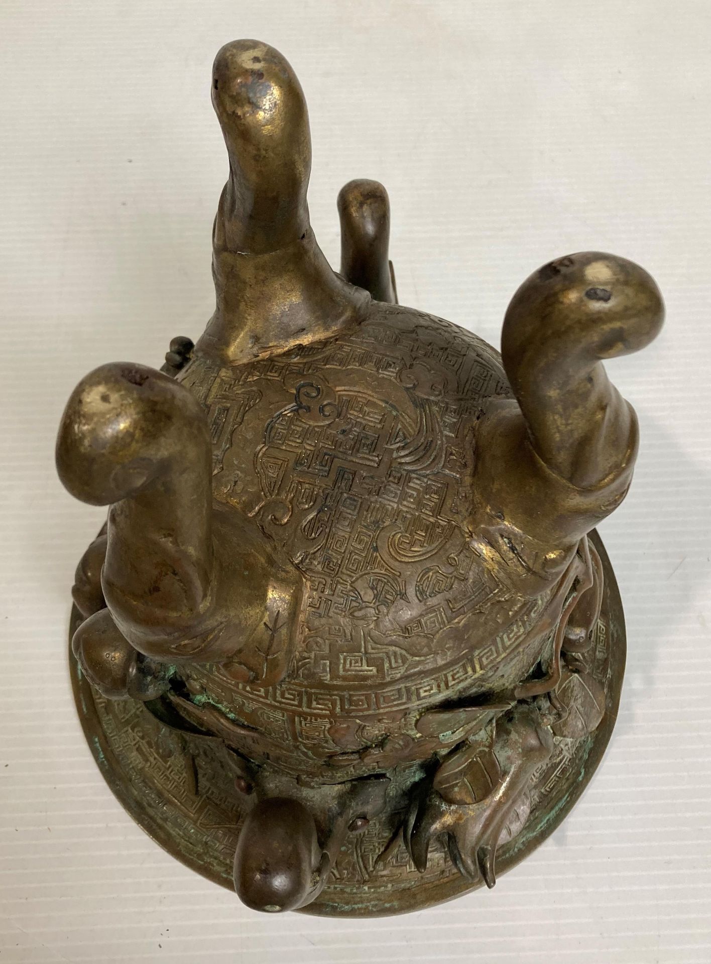 An Oriental bronze incense burner with elephant head legs and two elephant head handles with - Image 7 of 21