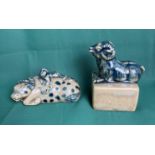 Two antique ceramic oriental 'Suiteki' water droppers including a ram on block with stamp to base