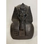 An Egyptian Pharaoh bust in polished blacks stone with hieroglyphics to each side,