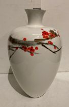 Modern floral design vase in white, black, red and gold,