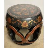 A Chinese black lacquered jardiniere stand with burgundy and gold floral detail,