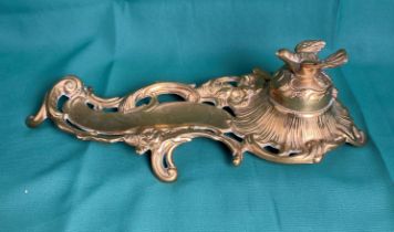 Polished brass Art Nouveau pen rest and ink well stand with bird to lid with metal insert,